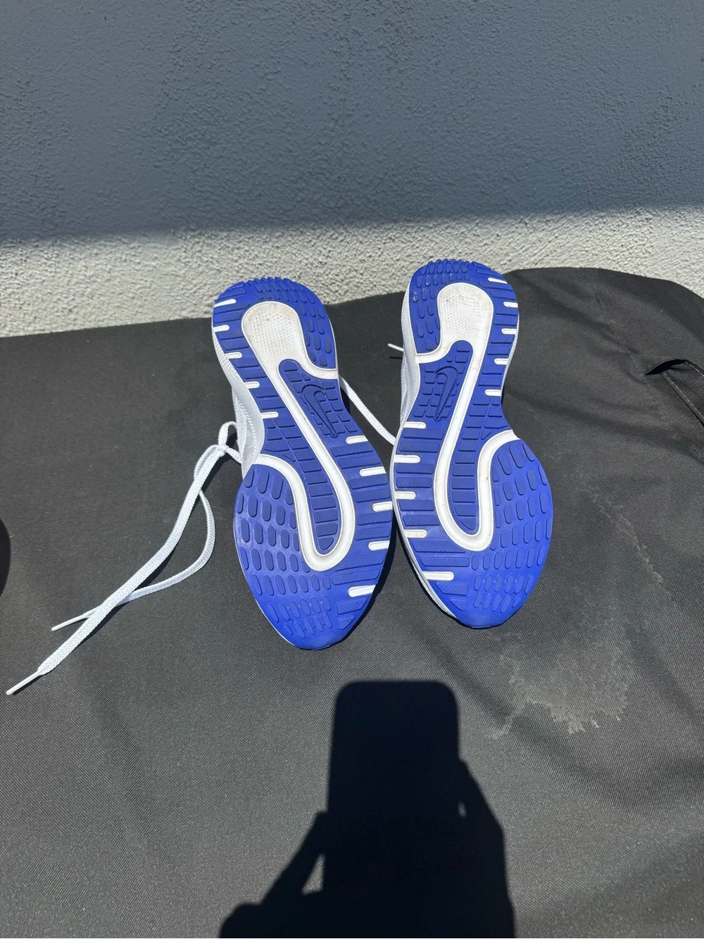 Nike White Running Sneakers with Blue Swoosh Accents